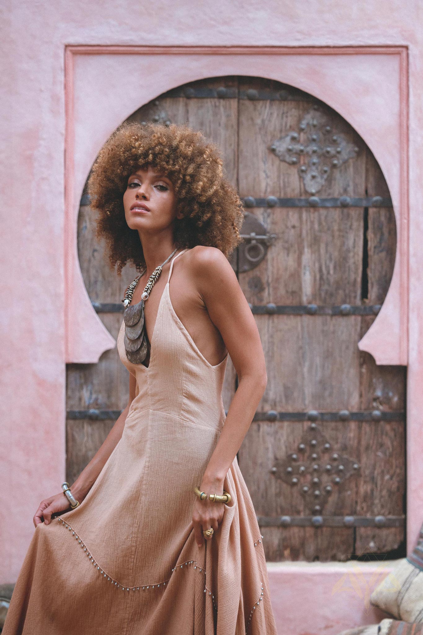 Feel like a true goddess in this beautiful, boho-inspired dress! Hand embroidery, open neckline, an ombre effect, and decorated with bells for a unique look.