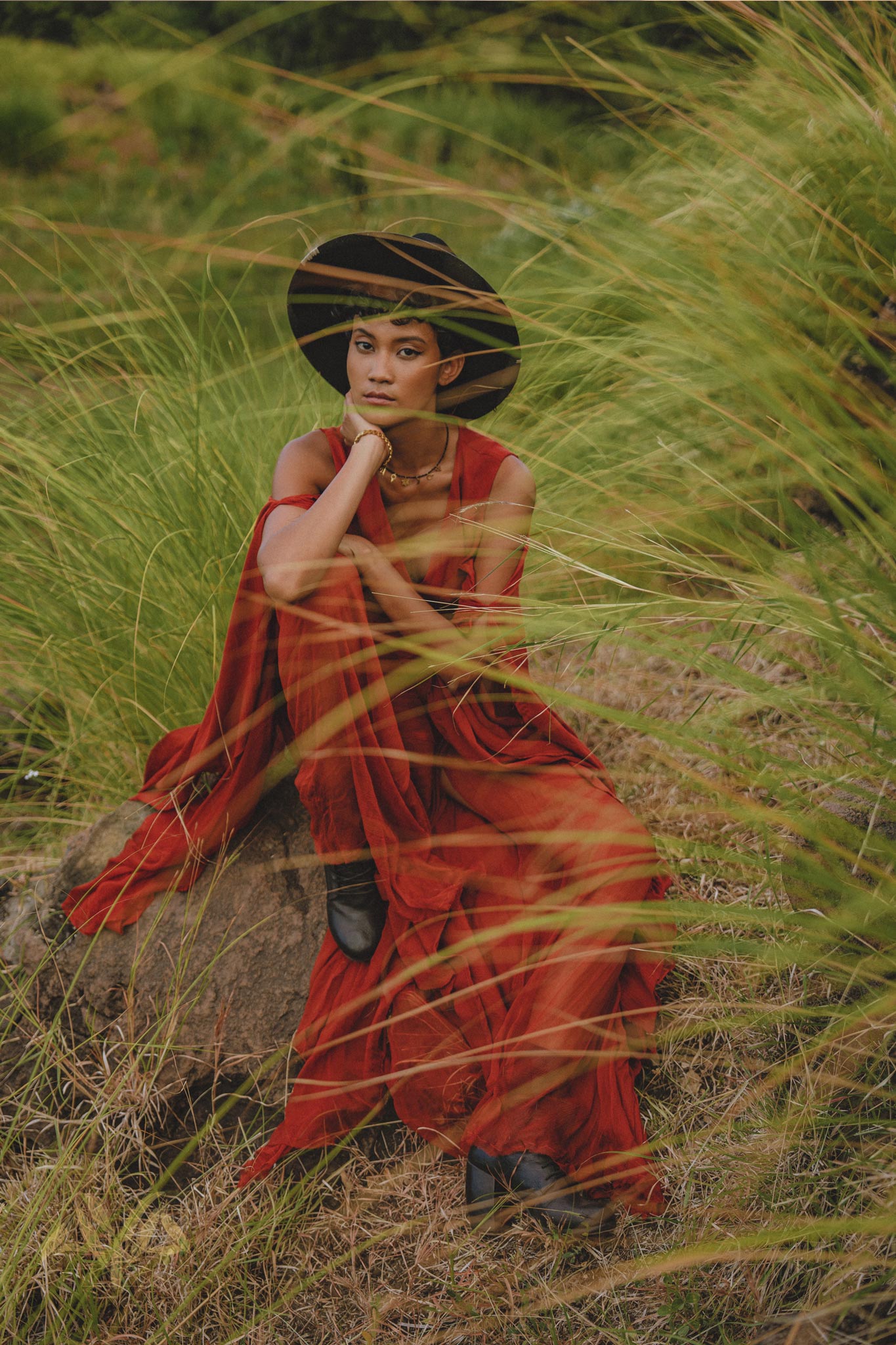 Stand out as a boho goddess in this red wine dress, designed with long bell sleeves for a unique touch.