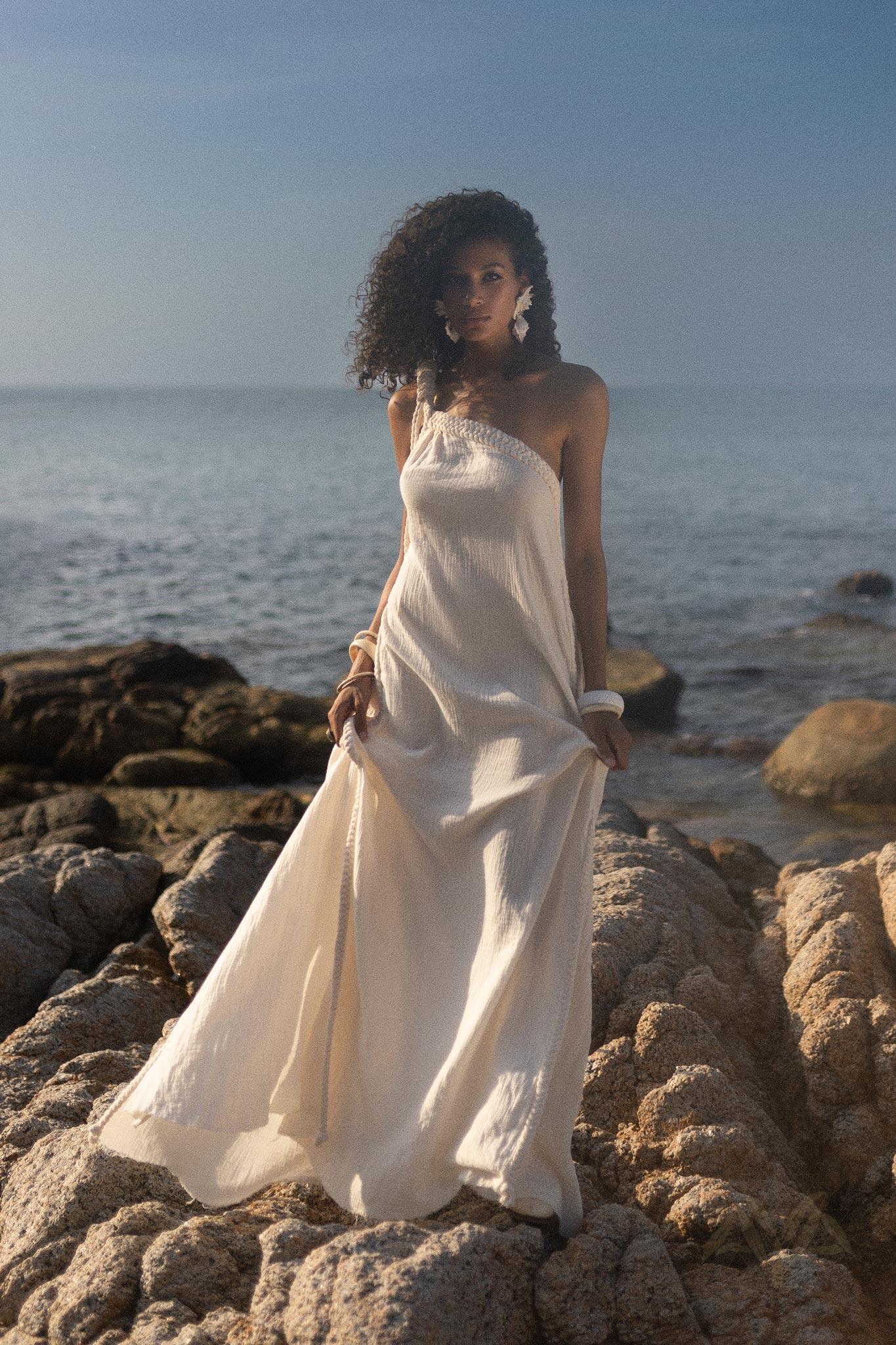 Boho Toga Asymmetrical Bohemian Dress: Embrace free-spirited style in our boho-chic toga dress. Handcrafted from soft, organic cotton, its asymmetrical silhouette and bohemian flair make it a standout piece for any occasion.