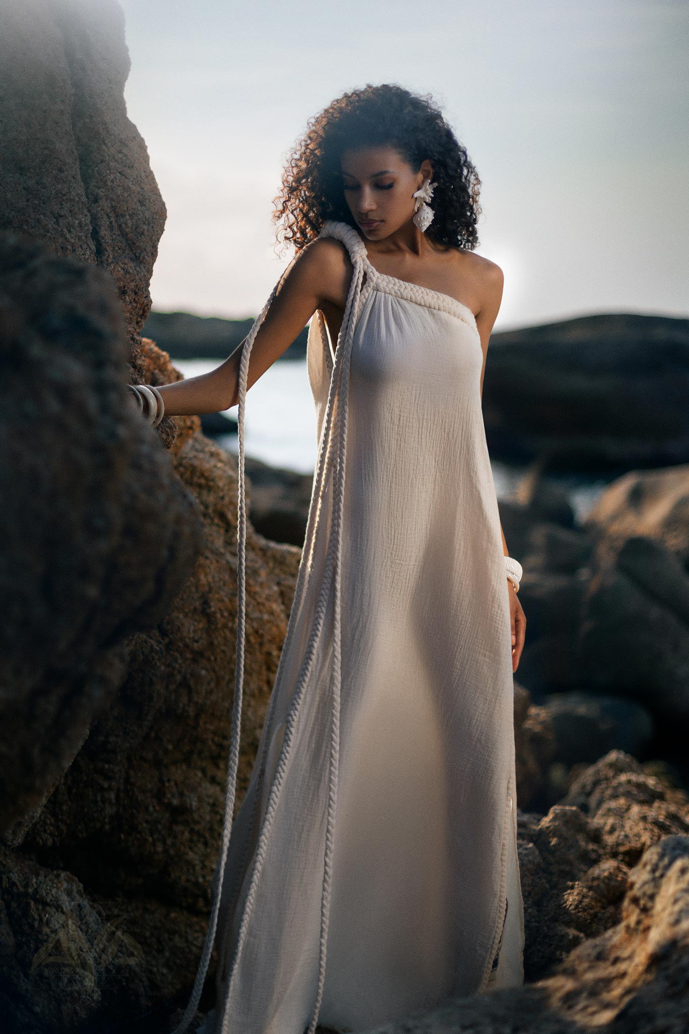 Braided Belted Dress: Elevate your ensemble with our sophisticated braided belted dress. Featuring intricate braiding detail and a flattering silhouette, it's the epitome of understated glamour.