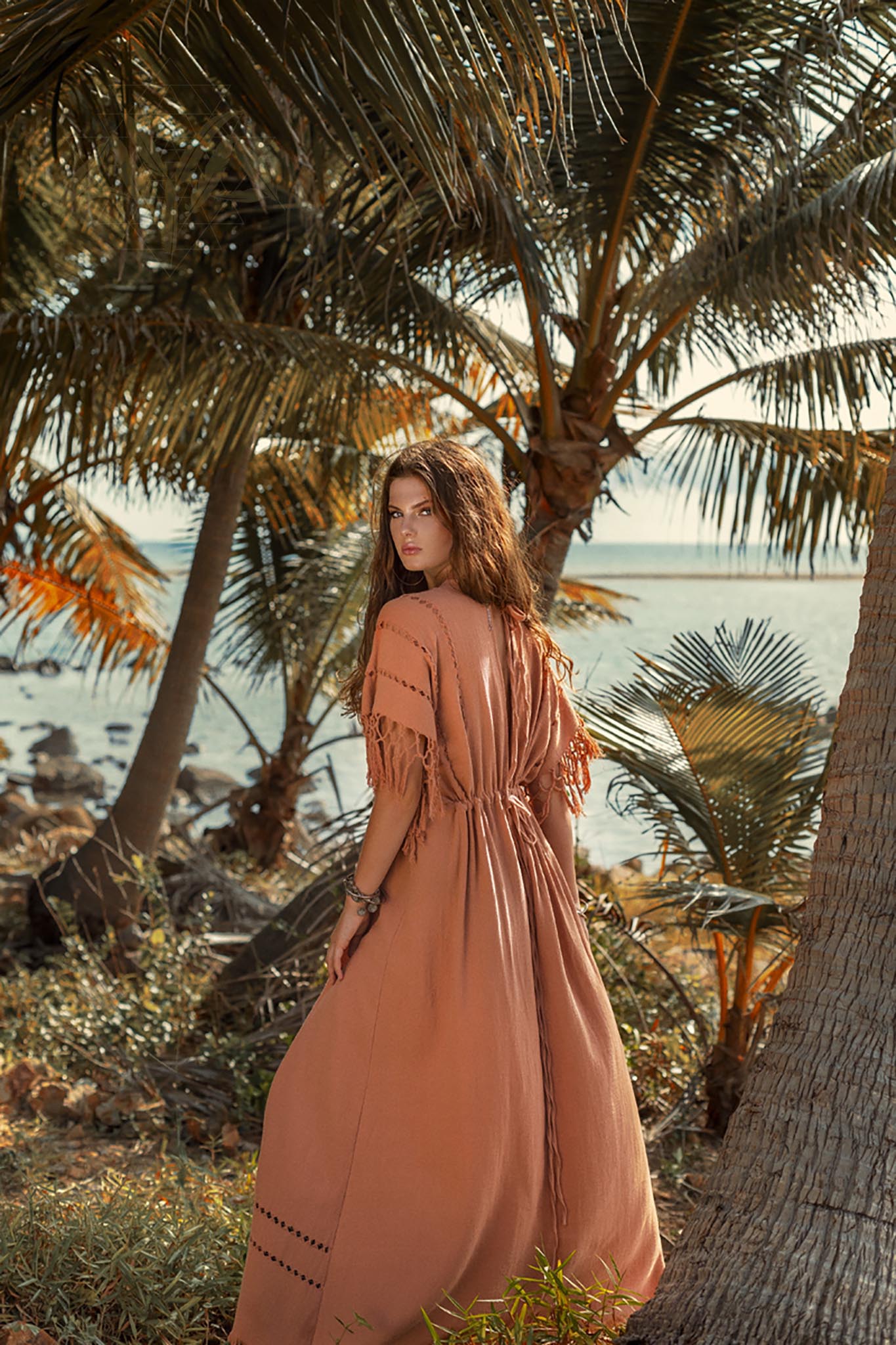 This is a perfect dress for a summer picnic. The light fabric and loose fit will keep you comfortable, and the orange colour will brighten up your day.
