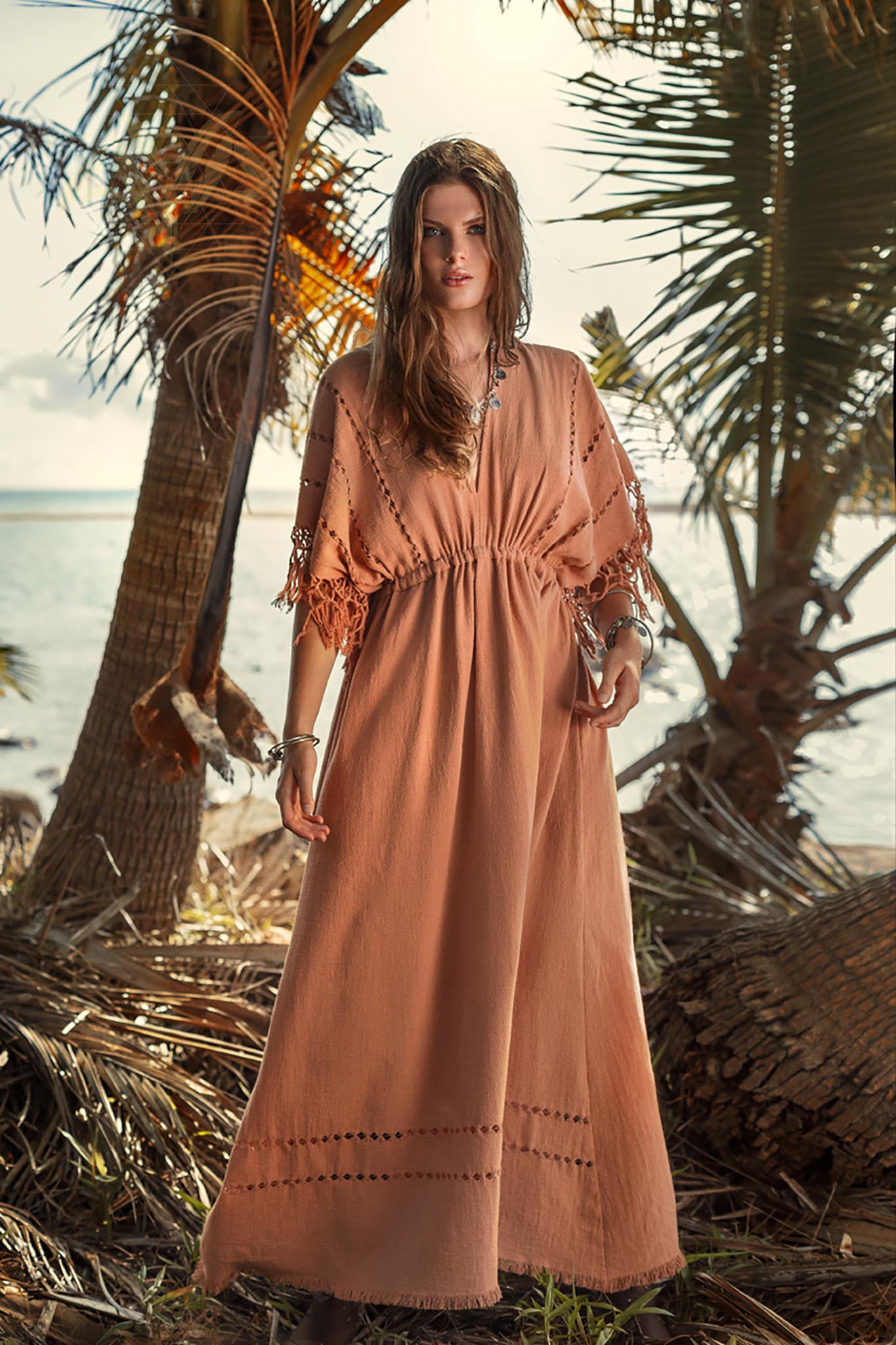 This is a great dress for a summer party. The orange colour is festive and fun, and the light fabric will keep you cool in the heat.