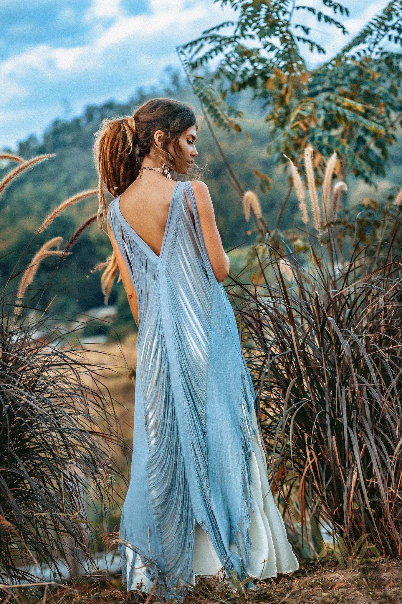 Embrace the trendy bohemian lifestyle with this stunning handwoven and hand-loomed dress!