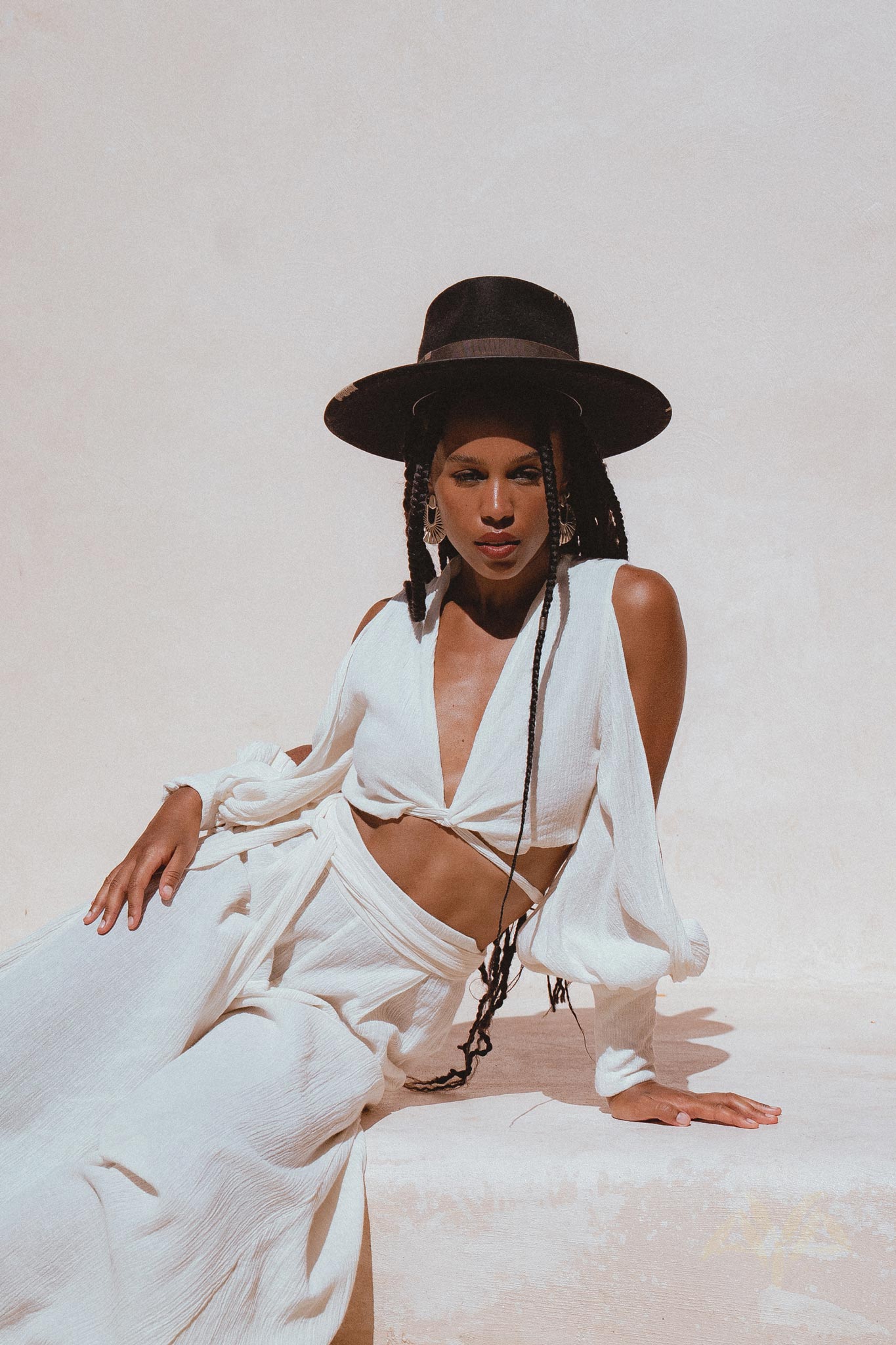 Complete your wardrobe with Aya Sacred Wear's Off-White Boho Set Top & Pants.