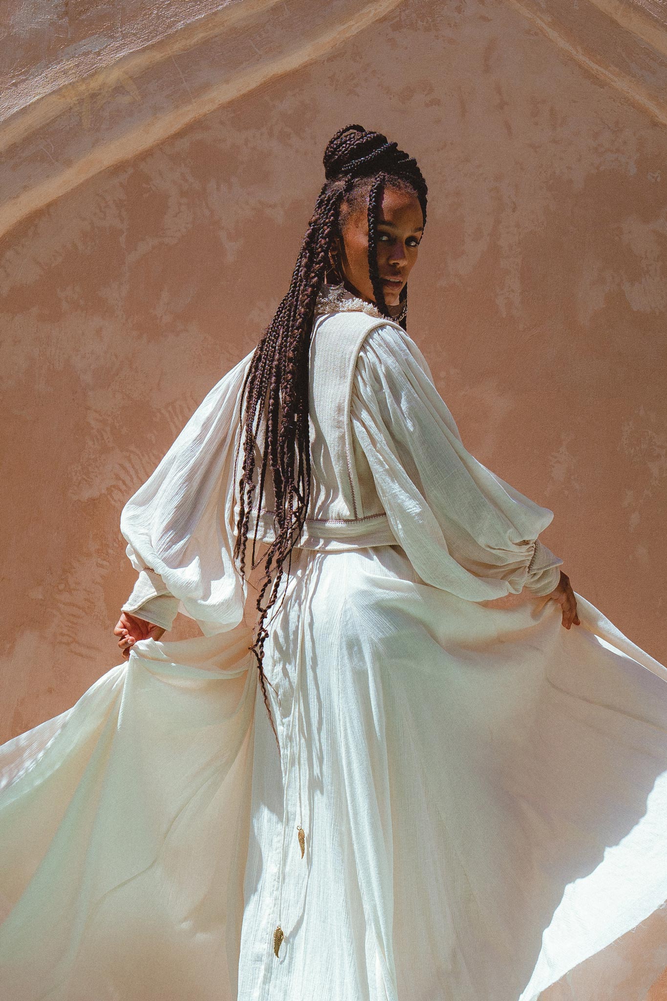 Get the look with the Off-White Puff Sleeved Top from Aya Sacred Wear!