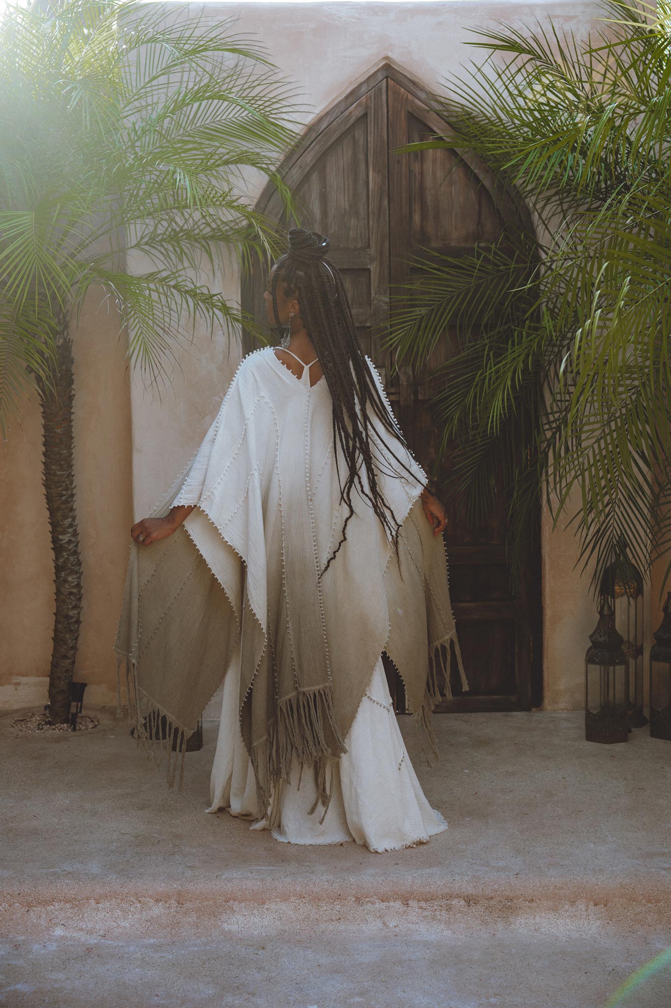 Add a touch of luxury to your wardrobe with a beautiful ombre sage green shawl from Aya Sacred Wear.