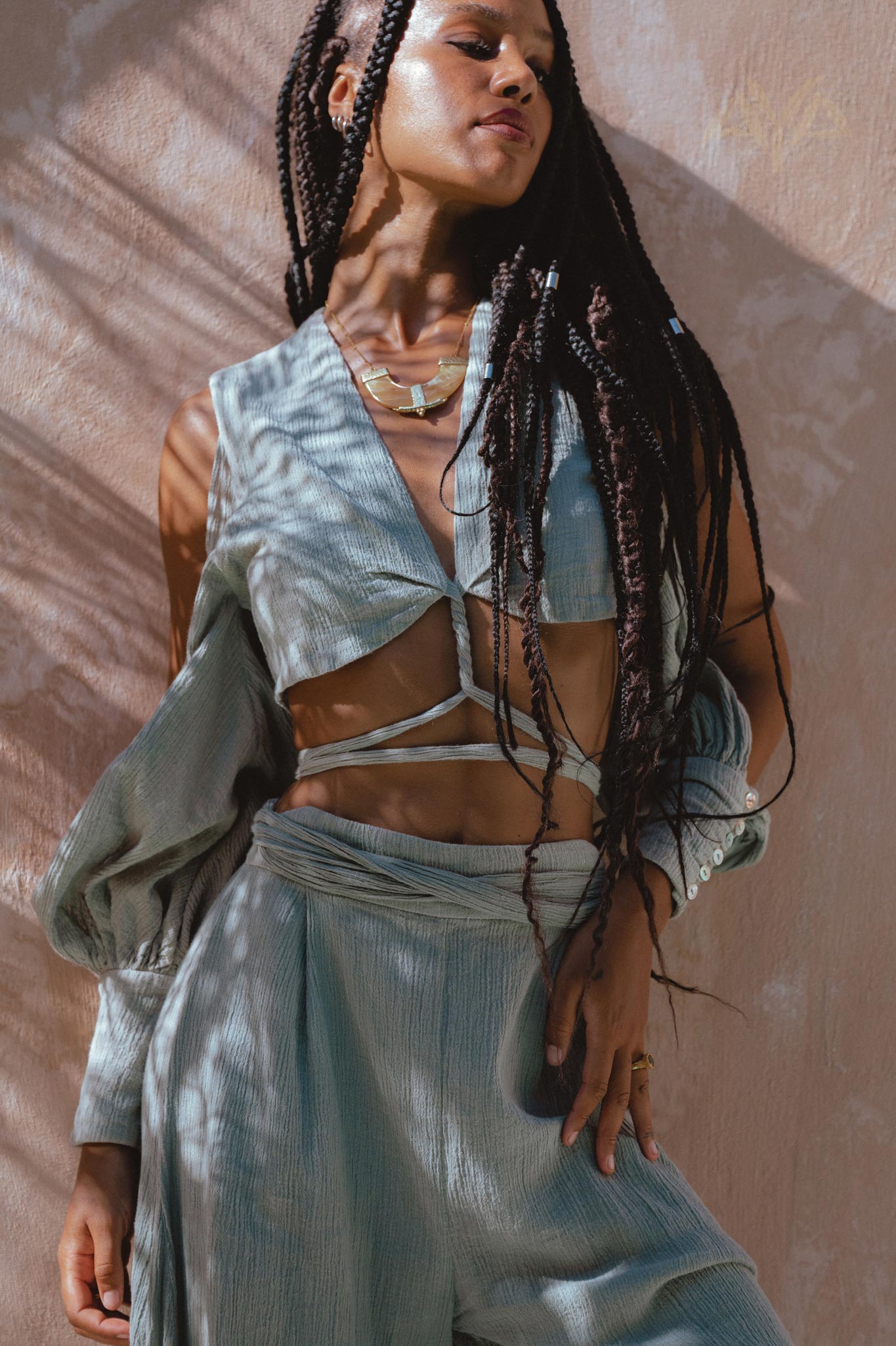 Step up your organic boho look with Aya Sacred Wear's Powder Blue Top and Trousers for women.