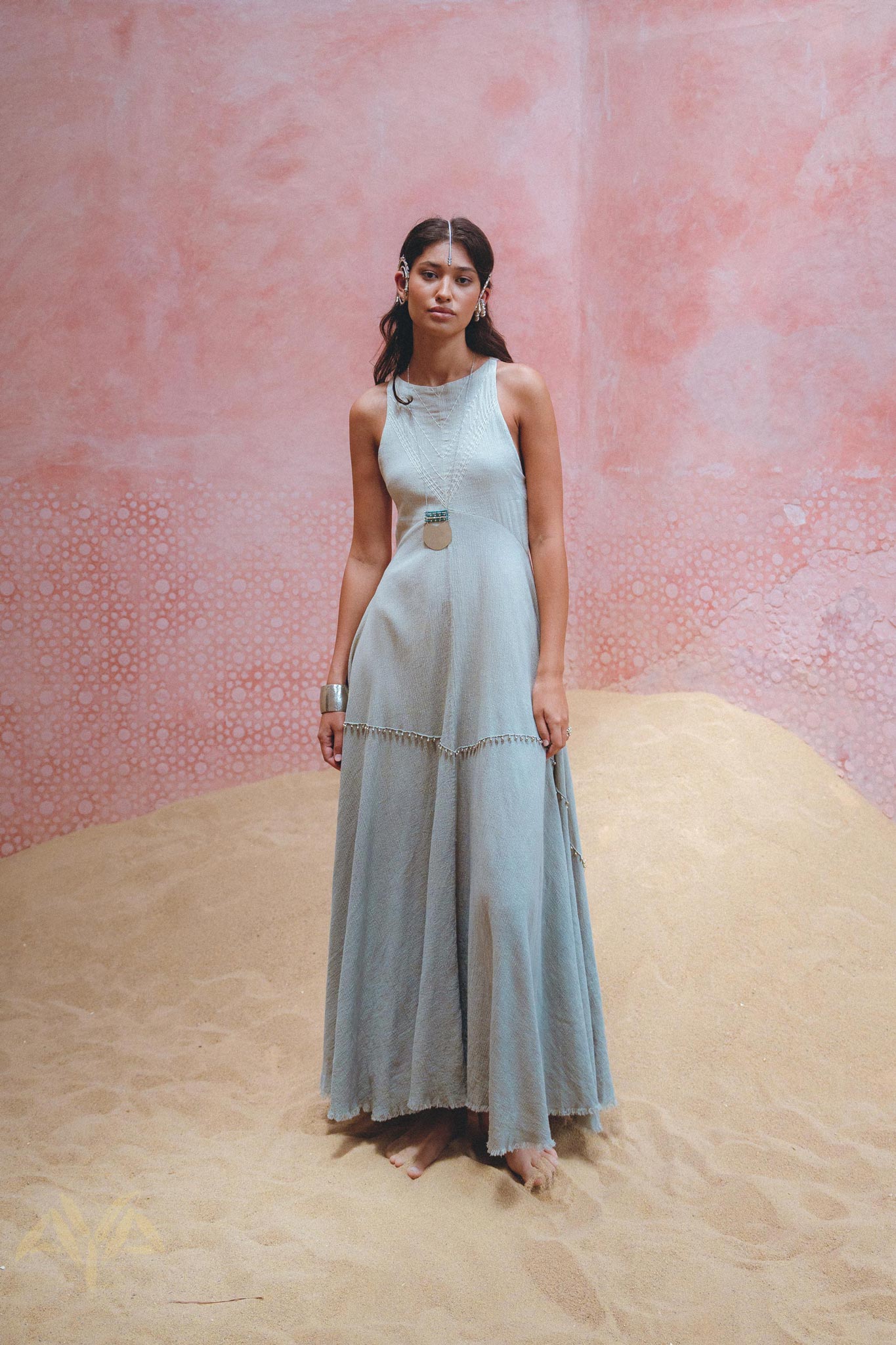 Shop Aya Sacred Wear's stunning hand embroidered sky blue dress for a unique, one-of-a-kind look.