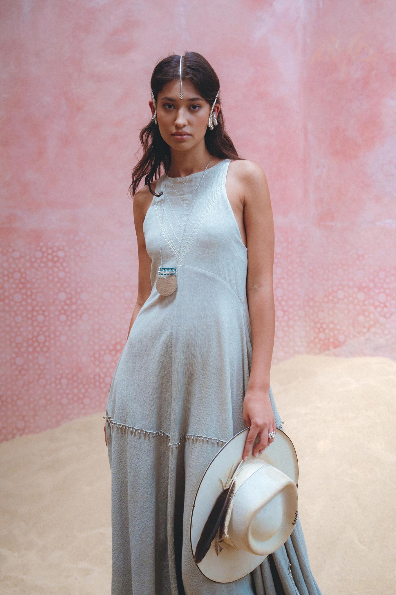 Make a statement with Aya Sacred Wear's hand embroidered sky blue dress.
