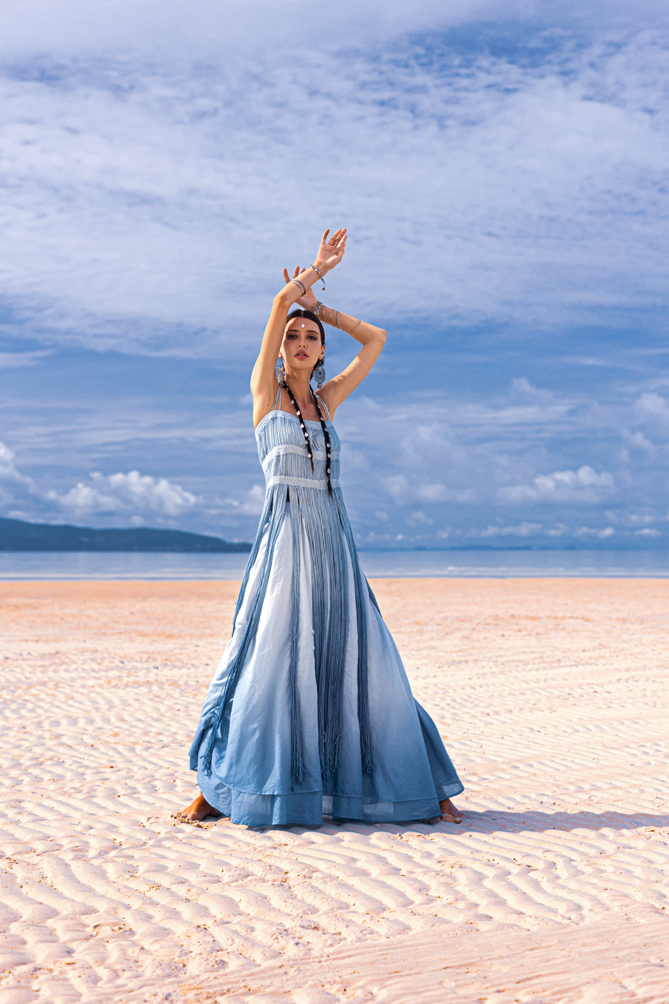 Greek Goddess Elegance: Sky Blue Macrame Dress with See-Through Delicacy. Embrace the enchantment of our botanically dyed collection for a boho off-shoulders look.