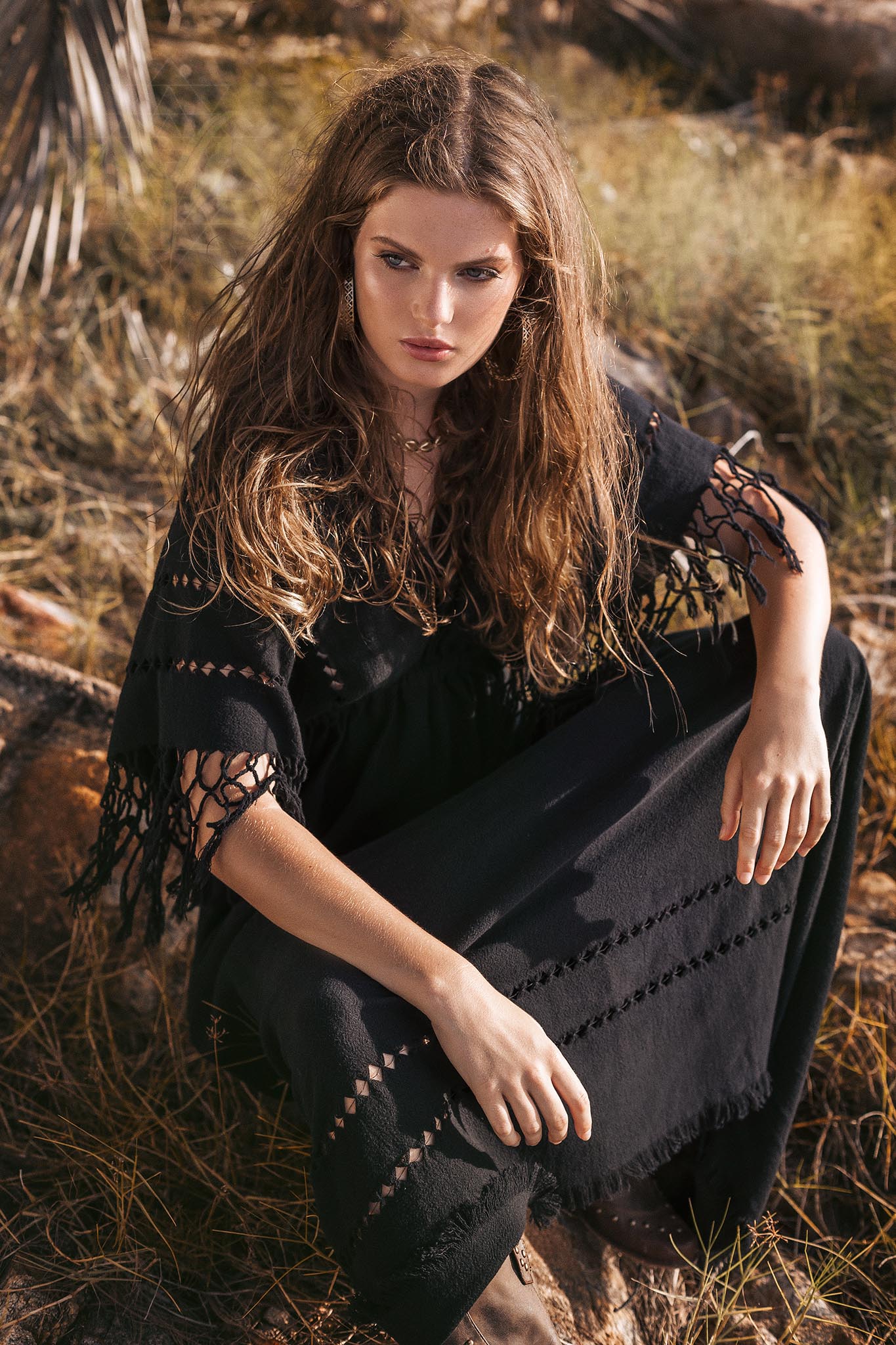 Handlooms and fringes add uniqueness and sophistication to this outfit. 