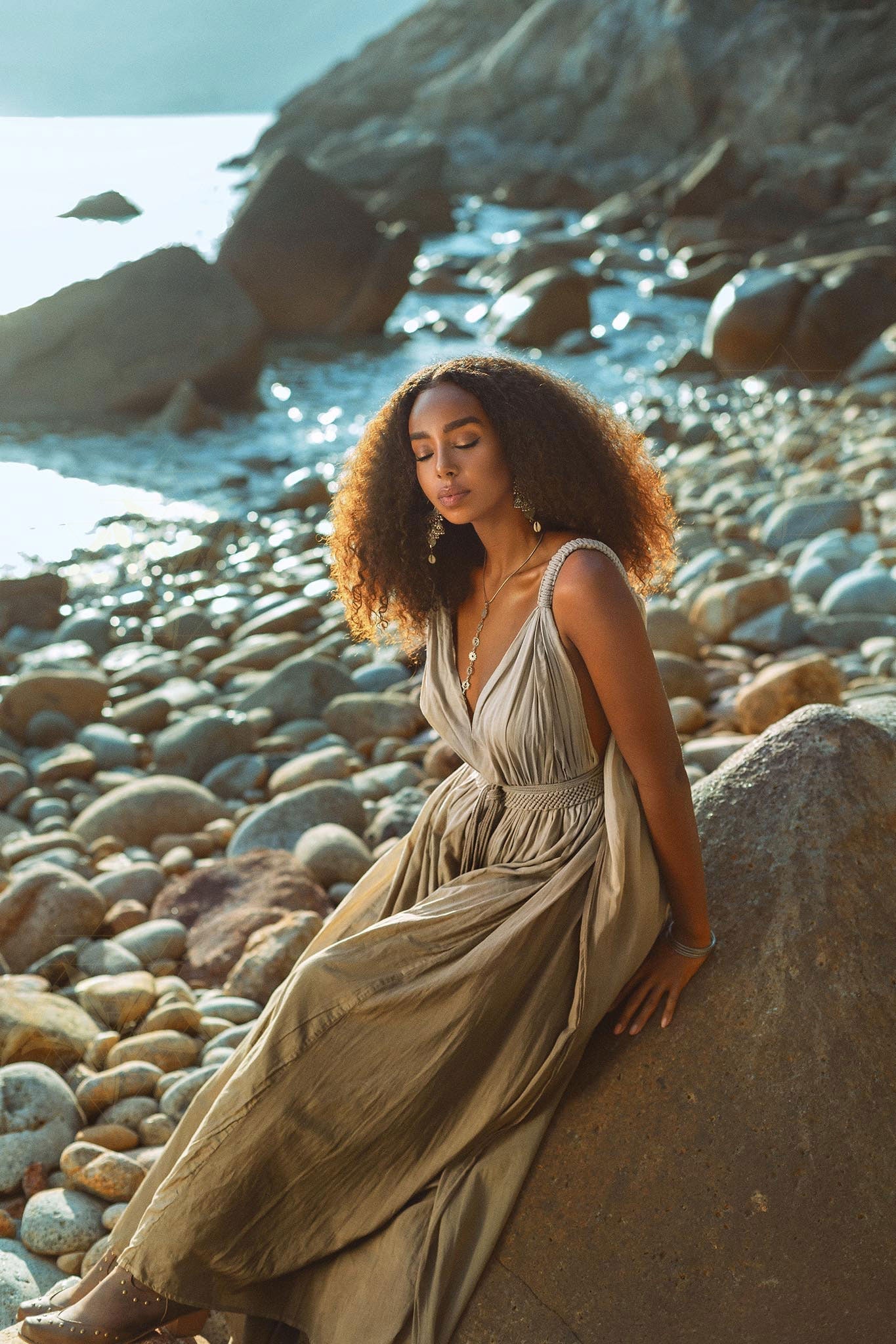 A boho-chic macrame dress in green, perfect for a summer day.