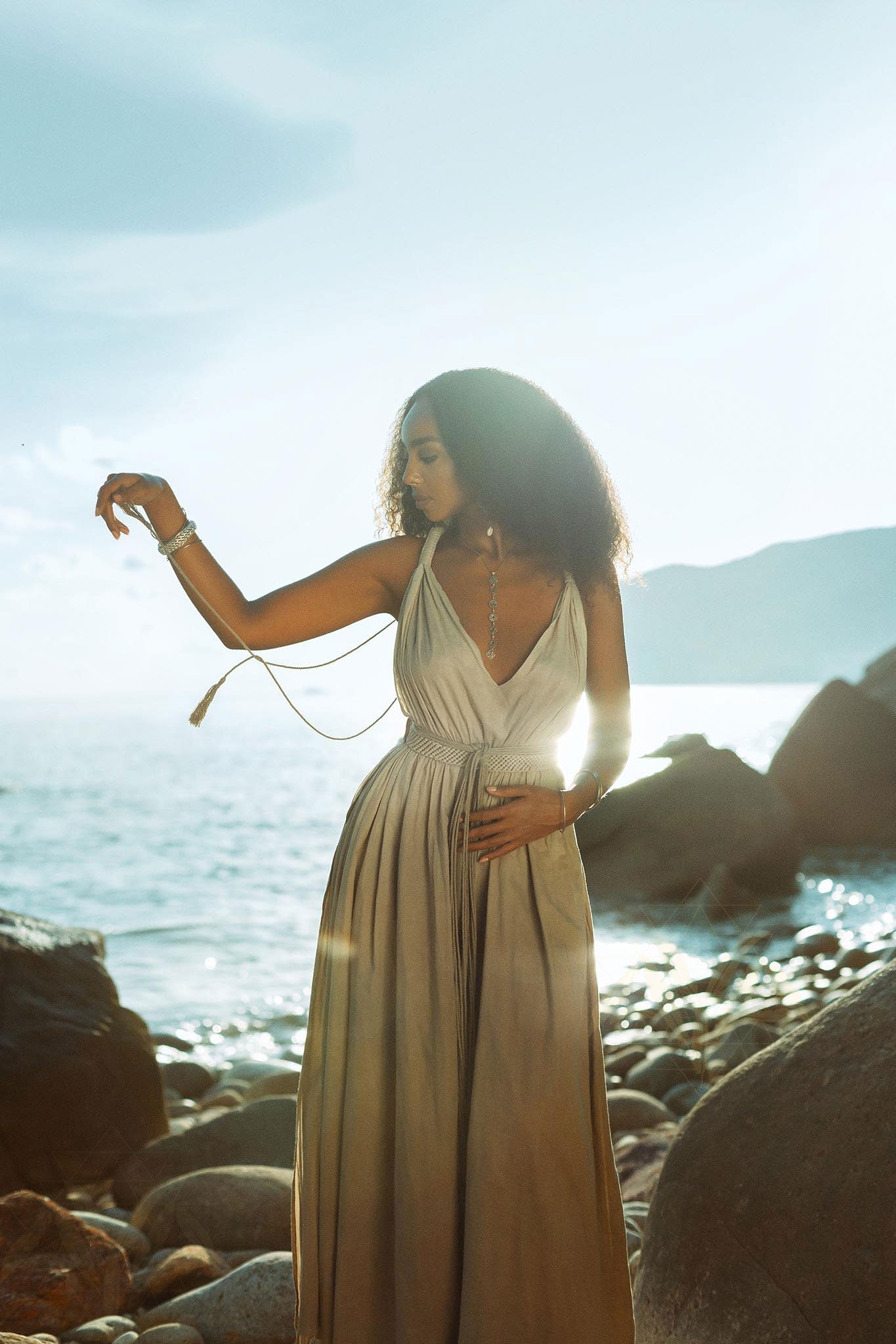 A versatile green dress that can be worn multiple ways.