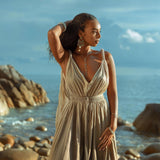 A stunning Grecian-inspired dress in dark green.