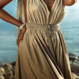 A lovely green dress with an adjustable silhouette.