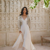 Exquisite Powder Blue Jacket with Puff Sleeves and Hand Embroidery - Boho Tassel Crop Top made of Organic Linen and Cotton.