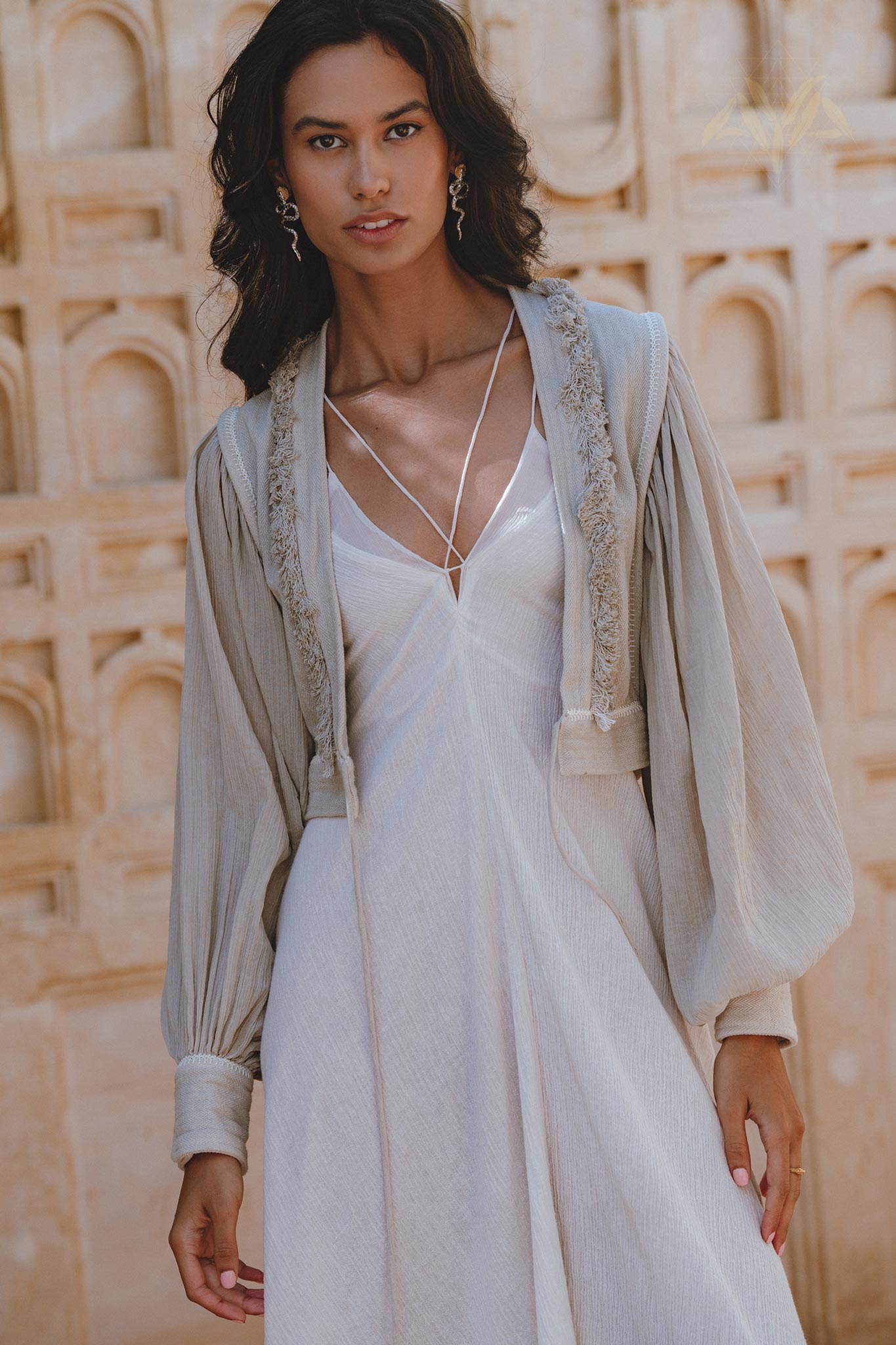 Artisan-Crafted Powder Blue Jacket with Adjustable Bohemian Design - Hand-Embroidered, Organic Linen and Mixed Cotton Sleeves.