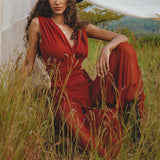Beautiful Red Wine Goddess Jumpsuit: Elegant and alluring, this backless evening overall is the perfect choice for an enchanting night out. Crafted with peace silk cotton, it offers a luxurious feel and a romantic, bohemian touch.