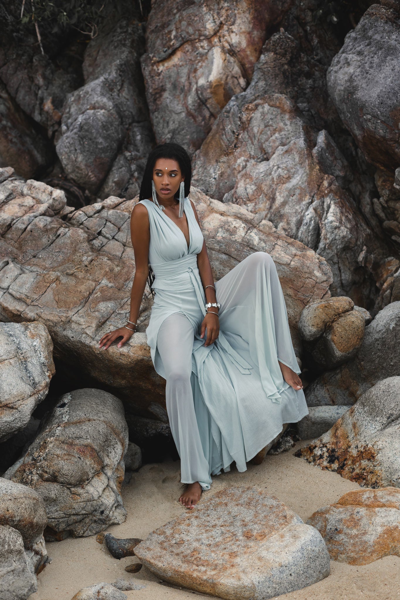 A blue boho jumpsuit for women that is sure to turn heads, made with the finest silk and cotton.