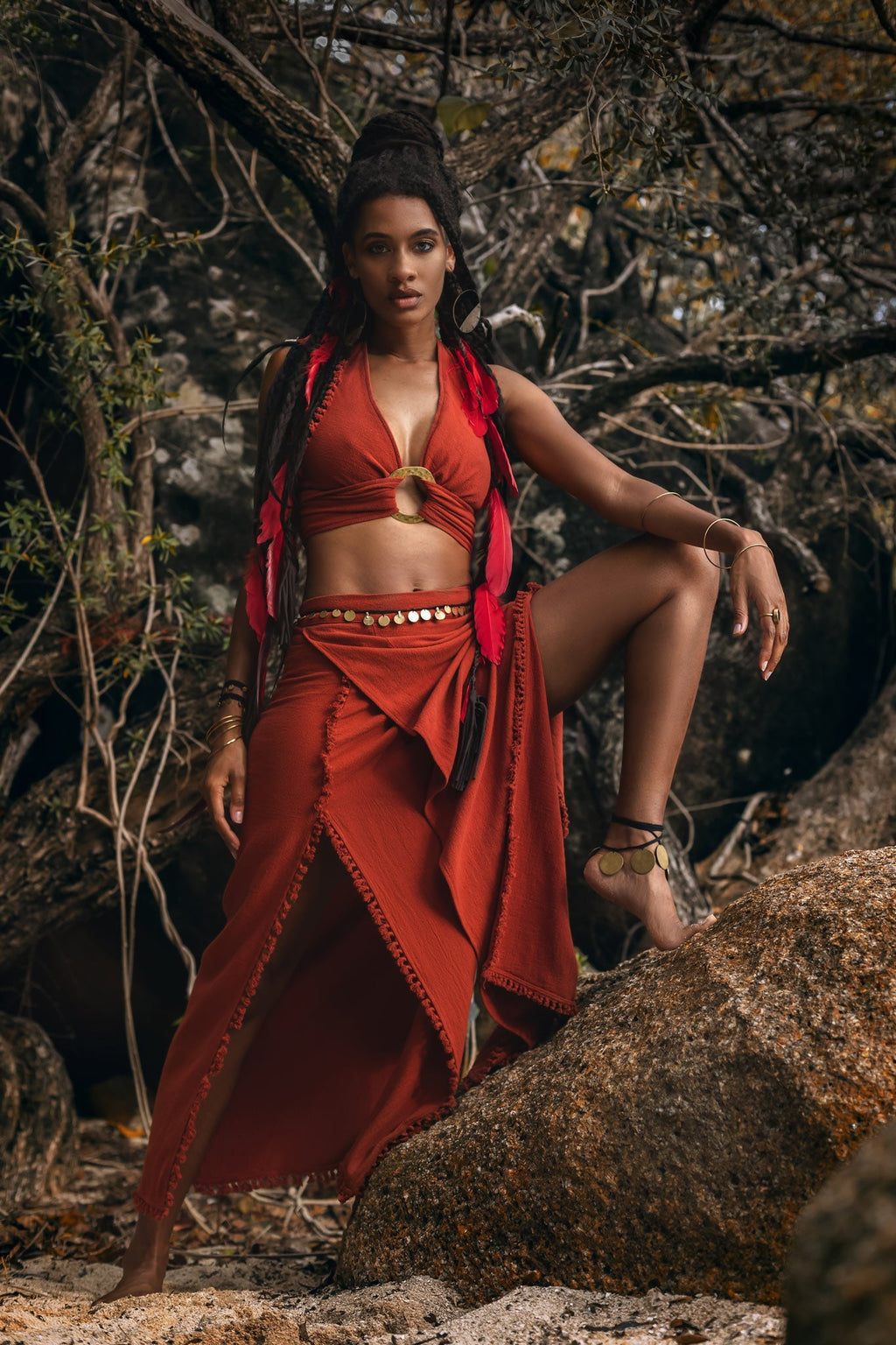 Add a touch of Bohemian flair to your wardrobe with this stunning red crop top!