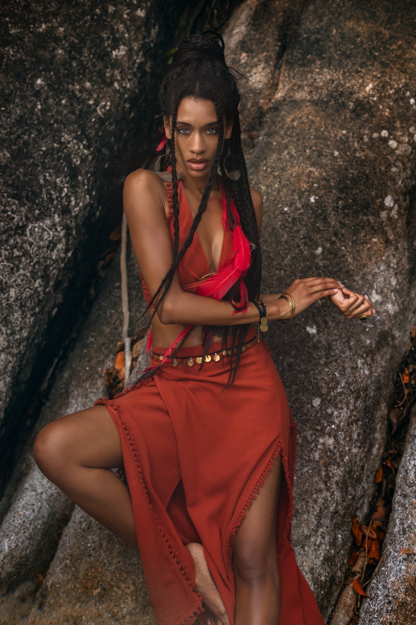 A beautiful and unique red Bohemian crop top with handmade knots.