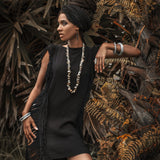 Ladders and open sides make this black mini dress a boho-chic must-have.