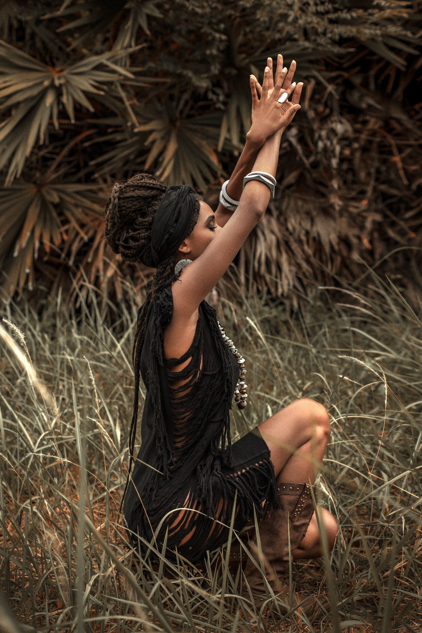 Show some skin in this sultry black mini dress with ladder cut-outs.