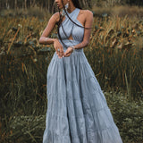 This light blue bohemian dress is perfect for any evening event. The open back and adjustable straps make it both comfortable and stylish.