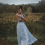 This boho evening dress is perfect for any special occasion. The light blue color and adjustable straps make it both unique and stylish.