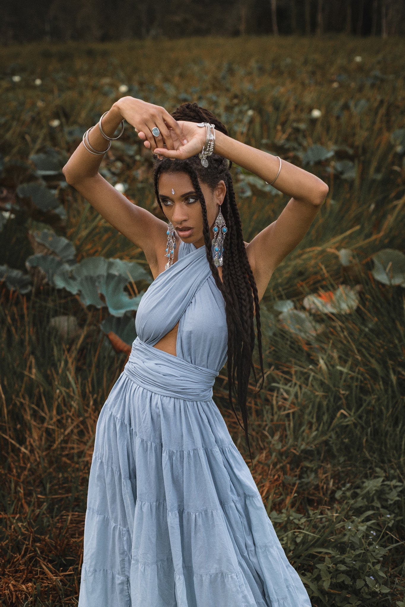 This boho evening dress is perfect for any summer event. The light blue color is perfect for any type of body.