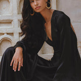 Black Gloss Goddess Dress: A bell sleeve boho dress, exuding grace and sophistication, suitable for weddings and cocktail evenings.