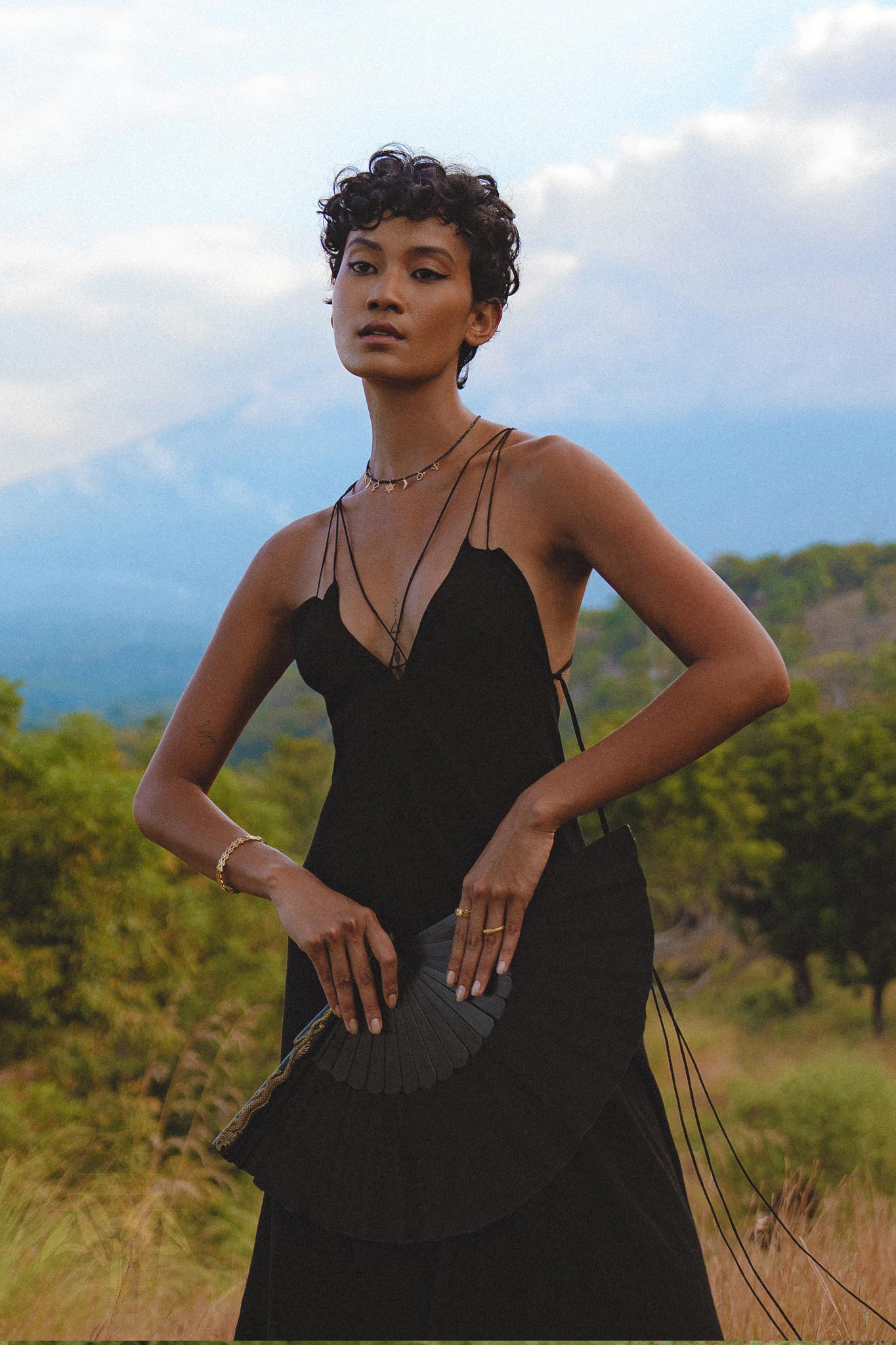 Exude bohemian elegance with this handmade black dress, showcasing delicate lacework. Perfect for a chic and stylish summer look.