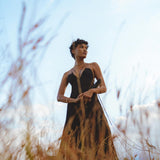 Boho elegance meets summer charm in this black cocktail dress. Crafted with intricate laces, it is the epitome of minimalistic beauty.