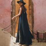 Look like a queen in the sophisticated black cape dress by Aya Sacred Wear.