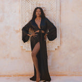 Chic Black Silk Wrap Top with Bohemian Style - Bell Sleeves Crop Top, Adjustable and Airy for Refined Occasions.