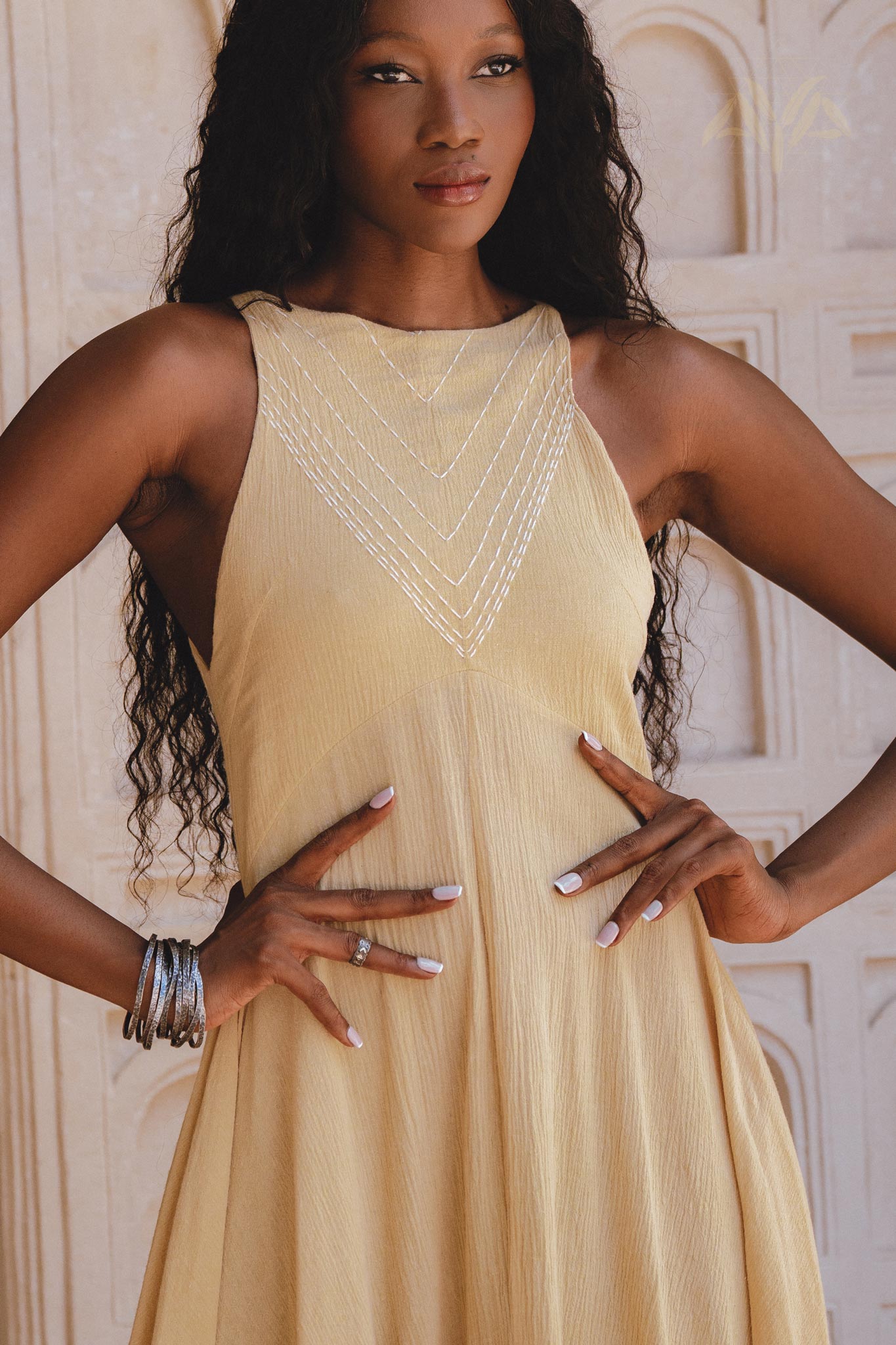 Hand-embroidered Gold Goddess Dress with small jingle bells, inspired by Indian culture. Lightweight, organic, and adorned with a unique ombré effect.
