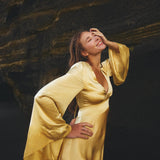 Feel like a goddess in the Golden Silk Goddess Dress from Aya Sacred Wear.