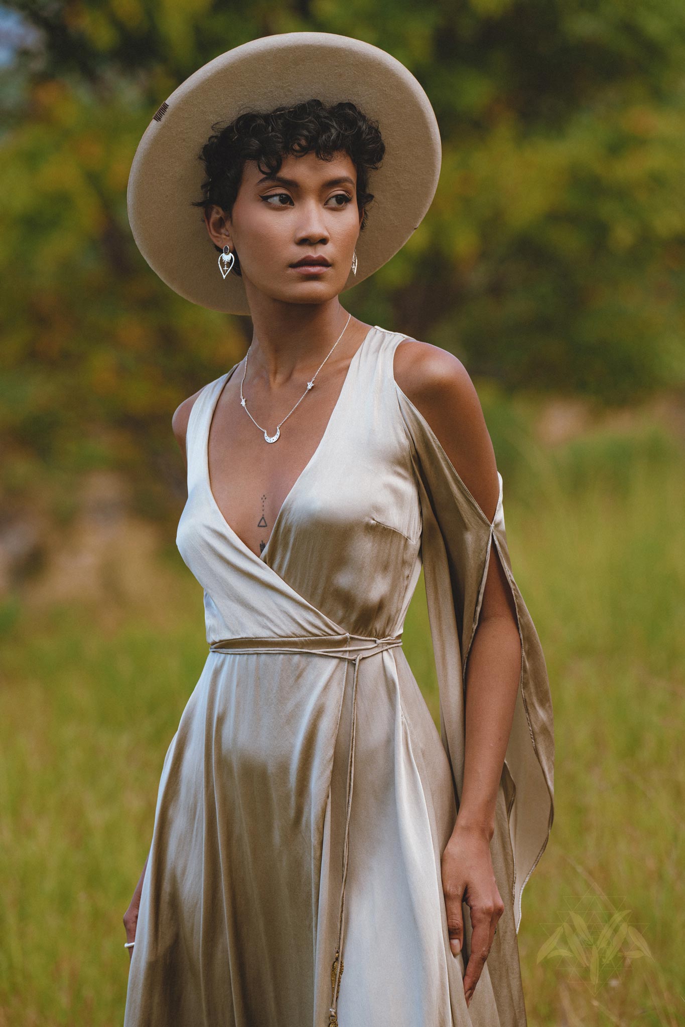 Stunning goddess dress in soft sage silk, an ideal choice for bridesmaids. Exuding grace and elegance, this wrap kimono maxi dress features exquisite bell sleeves.