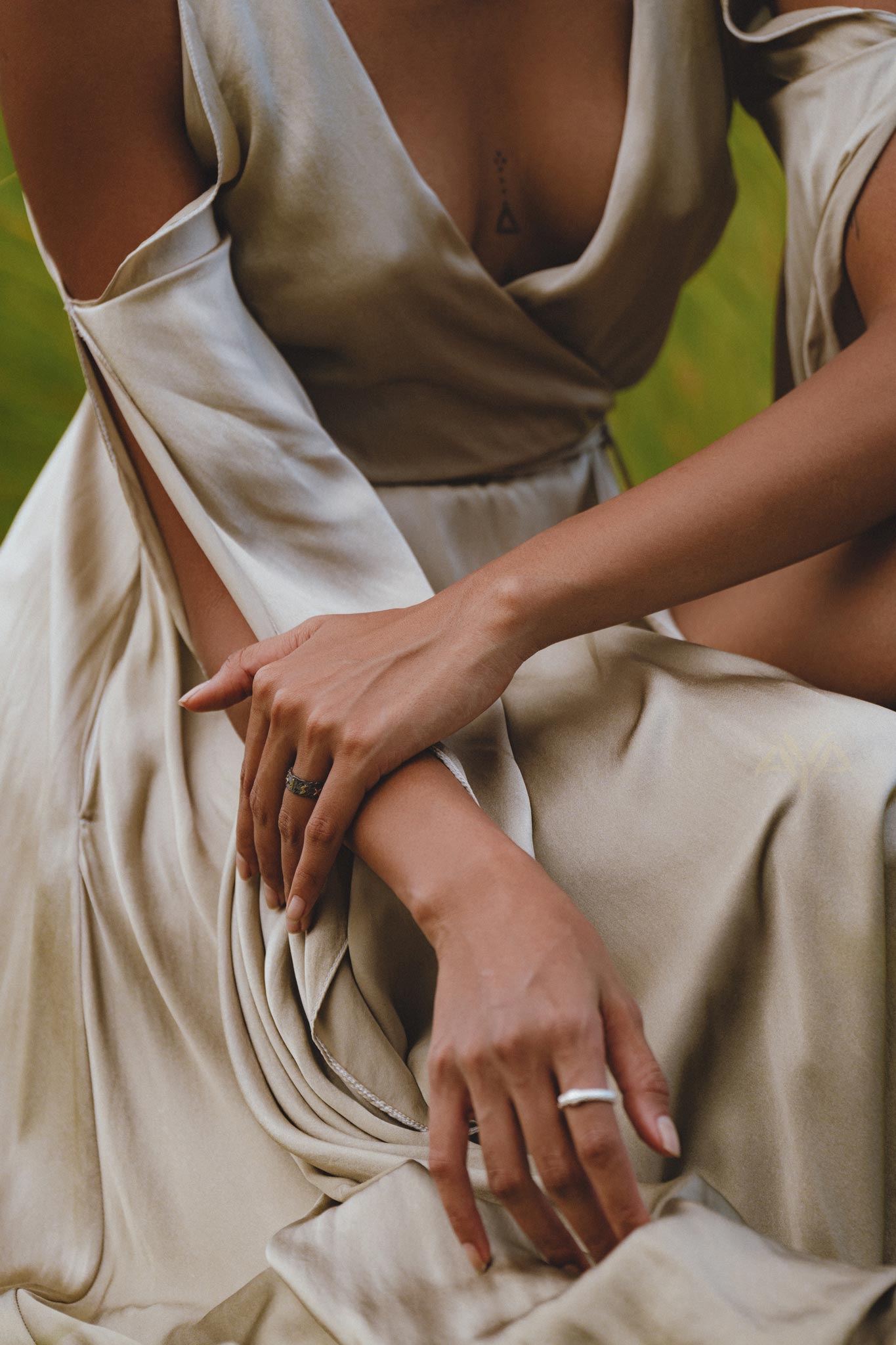 Embrace ethereal charm in this light sage silk dress, a versatile option for bridesmaids or wedding guests. The bohemian-inspired wrap kimono maxi style is defined by its graceful bell sleeves.