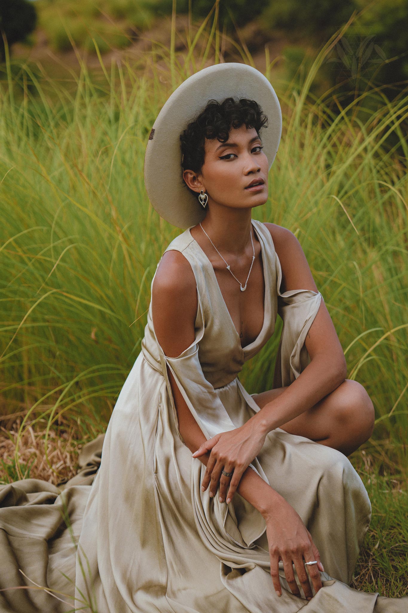 Indulge in the elegance of this light sage silk dress, perfect for both formal occasions and bohemian-inspired events. The wrap kimono style and bell sleeves add a touch of ethereal beauty.