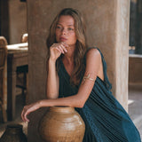 Be unique and beautiful with this asymmetrical maxi dress with handwoven tribal embroidery.