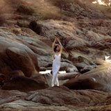 Mist blue peace silk maxi slip dress made from organic Ahimsa silk, soft, breathable, and ethically produced without harming silkworms. This bohemian gown features delicate handmade brass angel wing details and a flowing silhouette that flatters the body. Lightweight and airy, it is perfect for summer, travel, ceremonies, weddings, or everyday luxury wear. Botanically dyed with natural pigments, each dress is unique, sustainable, and designed for comfort, elegance, and timeless feminine style.