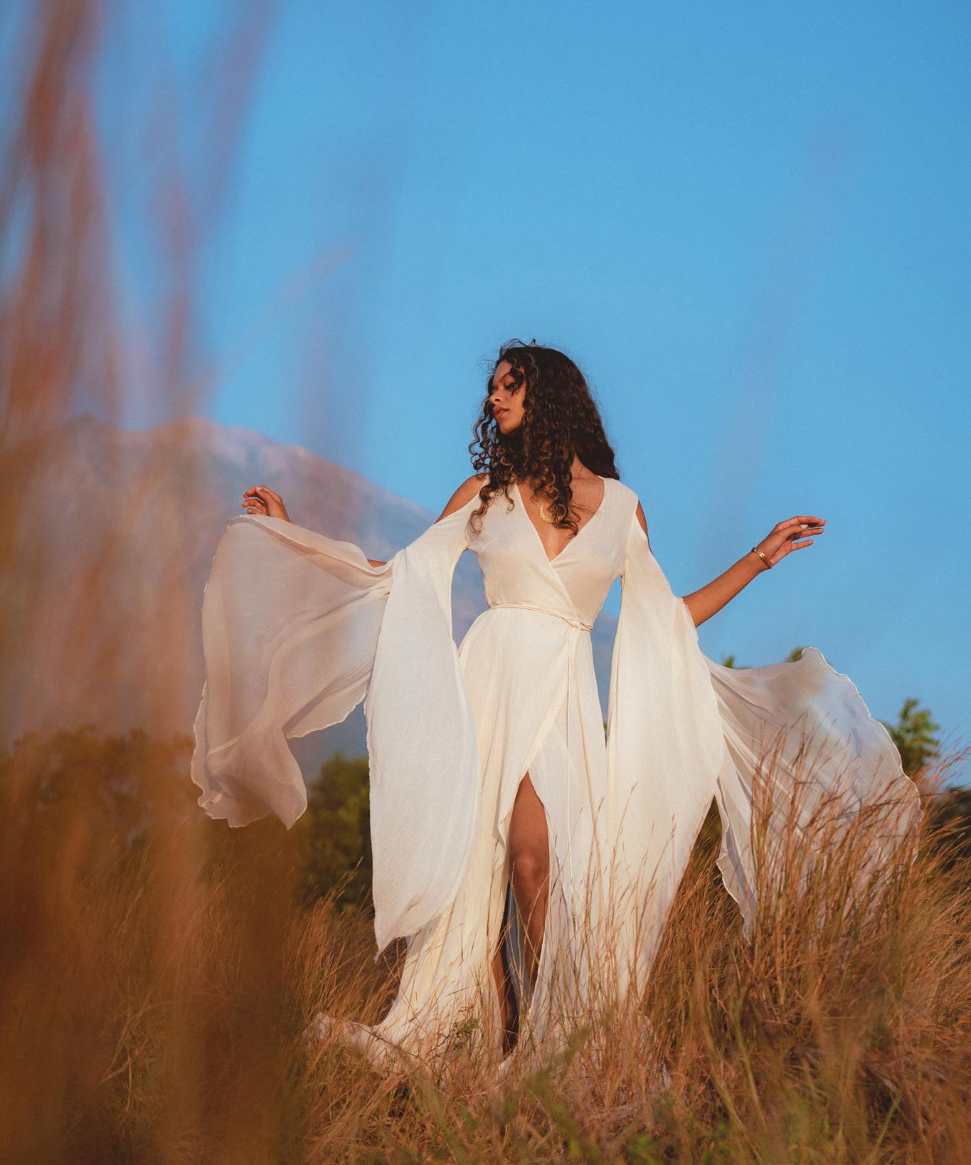 Look perfect on your special day in an off-white organic wedding dress from Aya Sacred Wear.