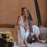 Stand out from the crowd in the Off-White Greek Goddess Cape Dress from Aya Sacred Wear.