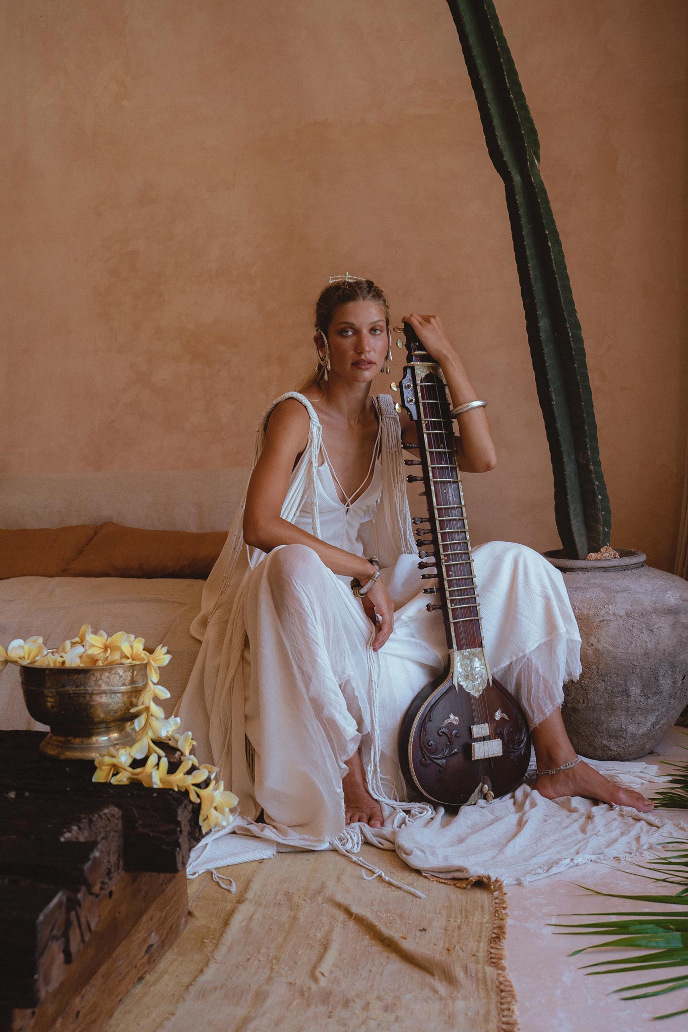 Stand out from the crowd in the Off-White Greek Goddess Cape Dress from Aya Sacred Wear.