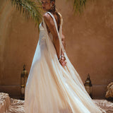 Make a bold statement in the Off-White Greek Goddess Cape Dress from Aya Sacred Wear.