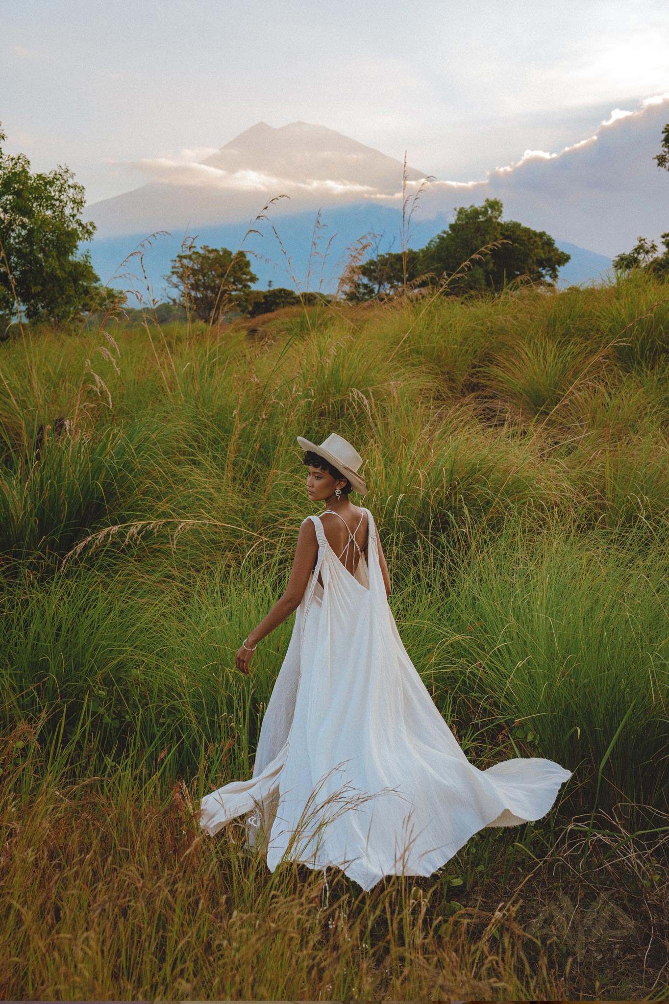 Show off your divine style in the Off-White Greek Goddess Cape Dress from Aya Sacred Wear.