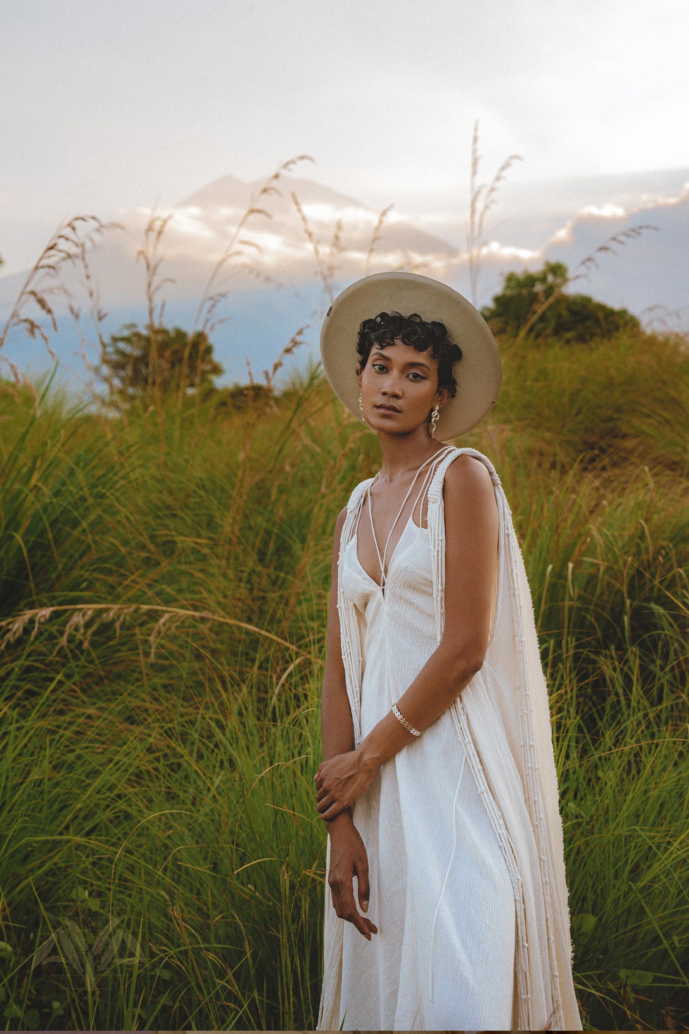 Be the envy of all the gods in the Off-White Greek Goddess Cape Dress from Aya Sacred Wear.