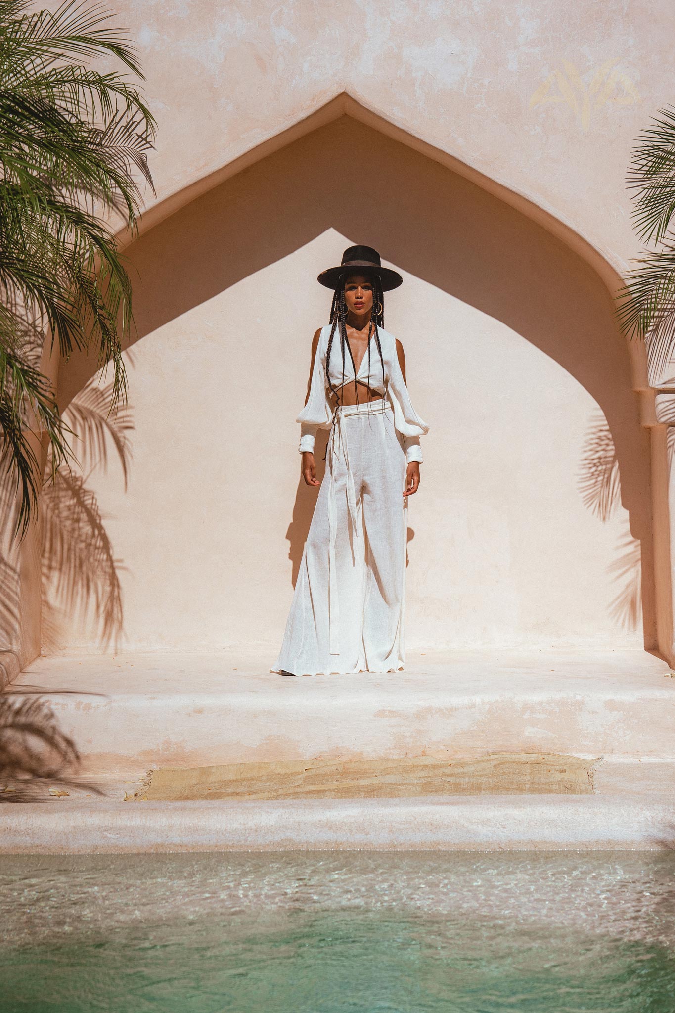 Get the stylish boho look with Aya Sacred Wear's Off-White Boho Set Top & Pants. 