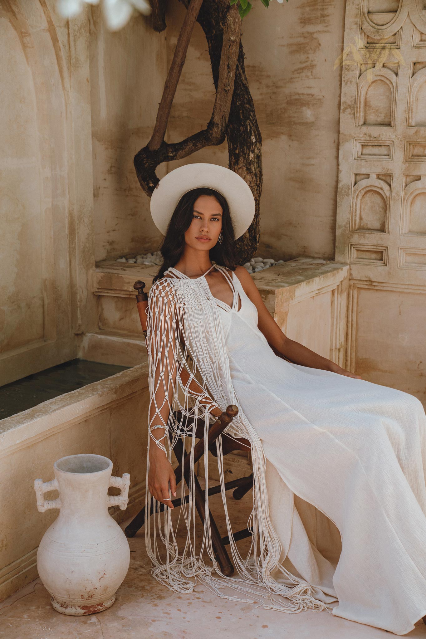 Boho-inspired Goddess Dress in off-white with sexy open neckline. Handmade with organic linen-cotton and a unique macramé design on the upper back